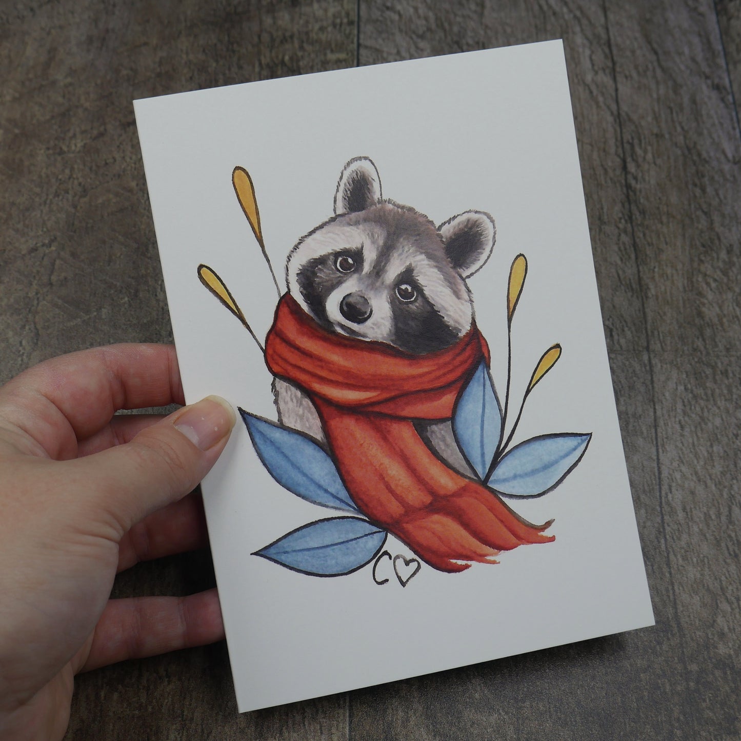 carte de souhaits raton laveur avec foulard orange