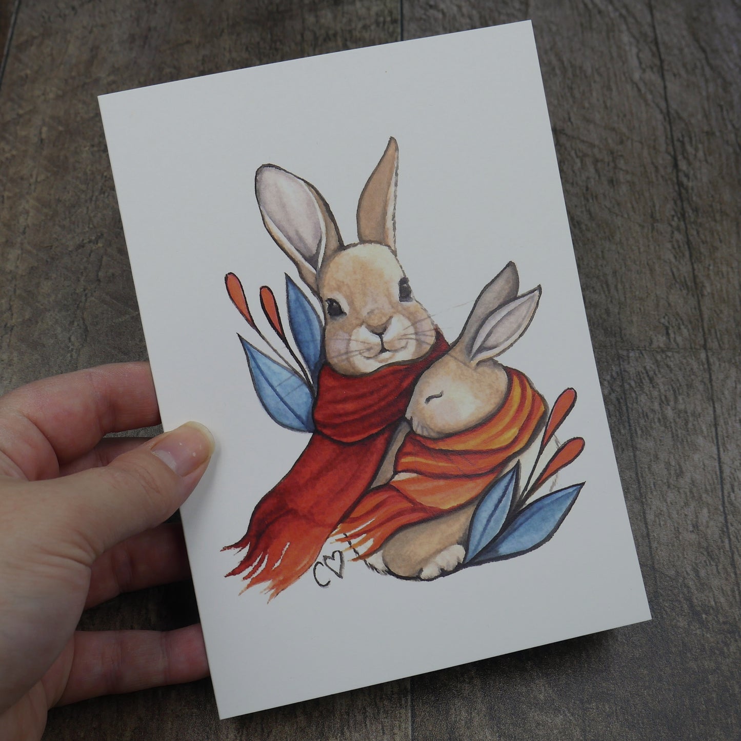 carte de souhaits couple de lapins avec foulard