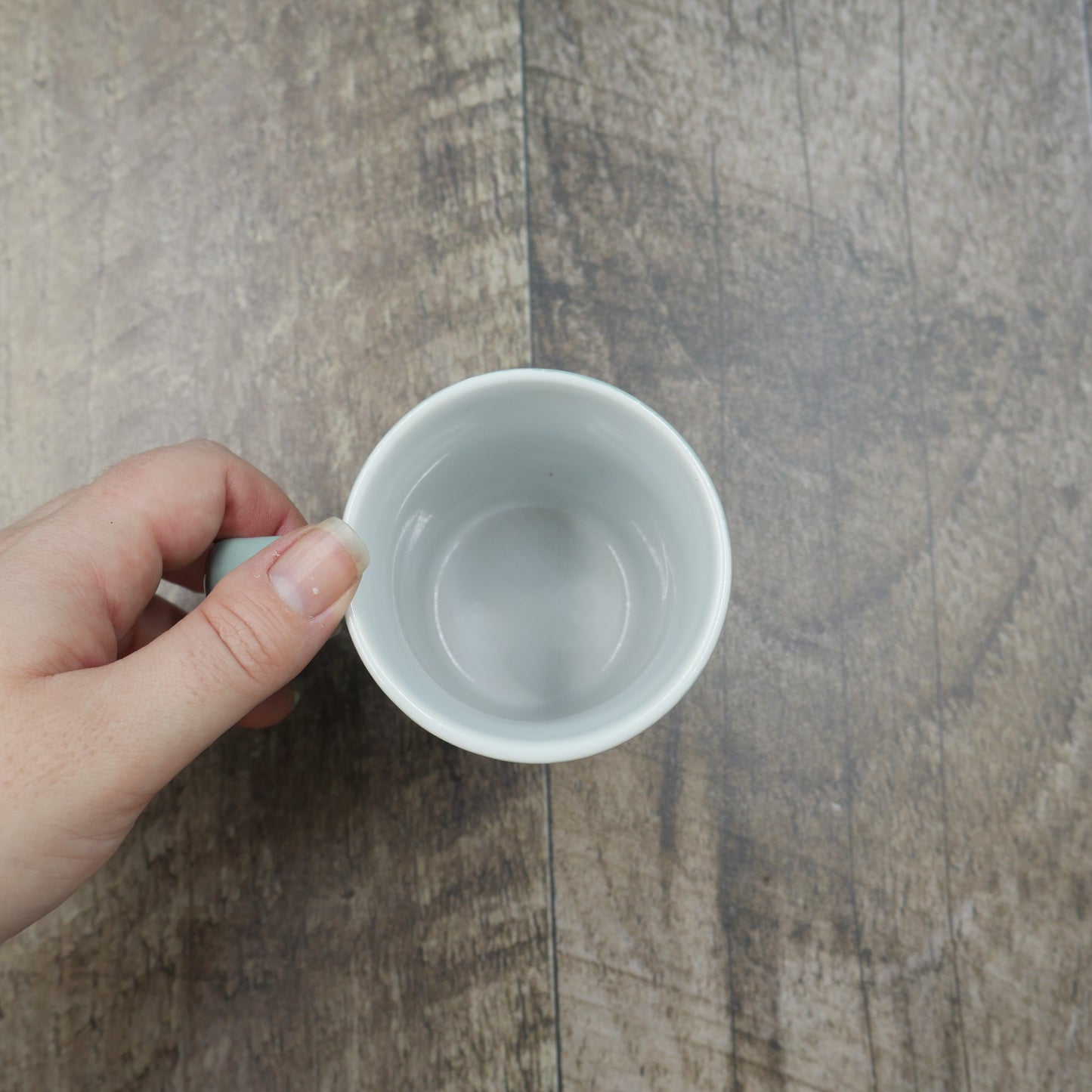 Petite tasse turquoise bonhomme de neige avec foulard