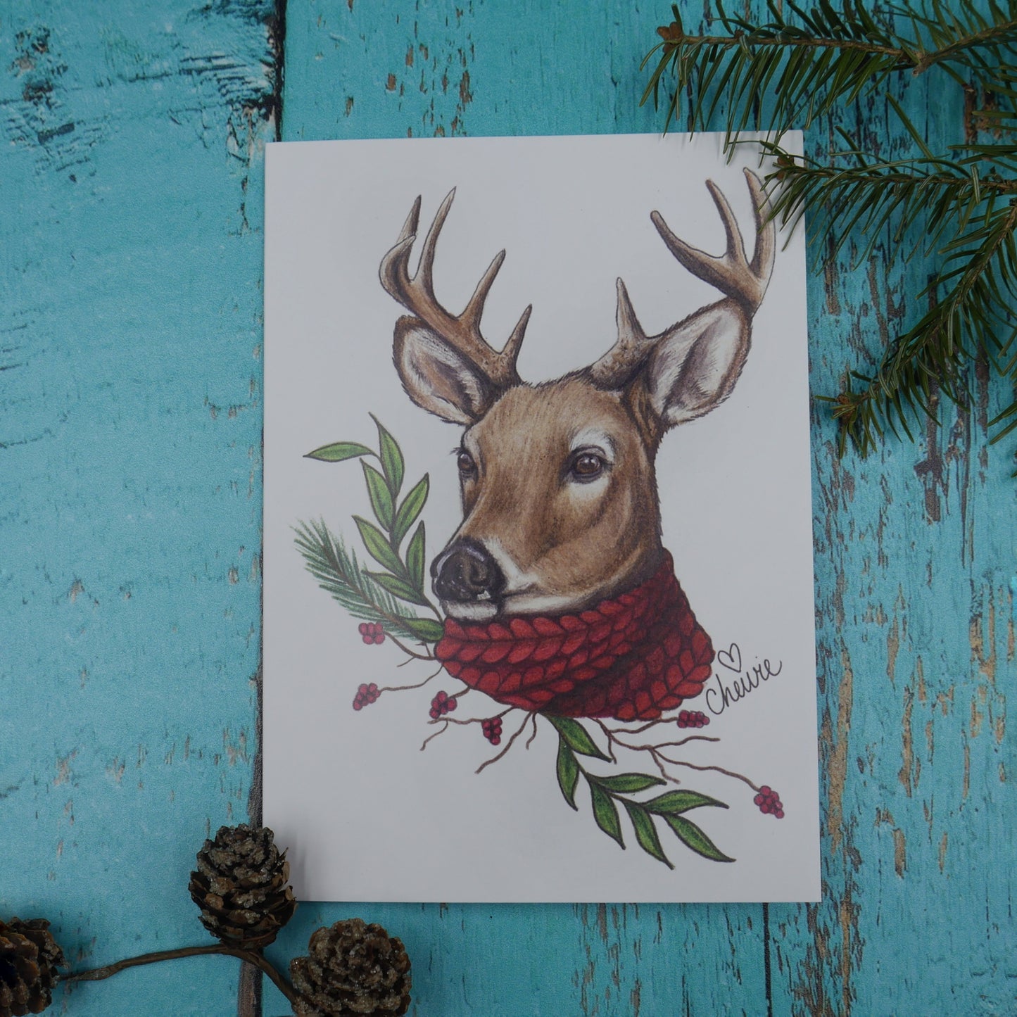 Carte de souhaits chevreuil avec foulard rouge