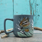 Tasse verte tamia rayé avec foulard et mitaines